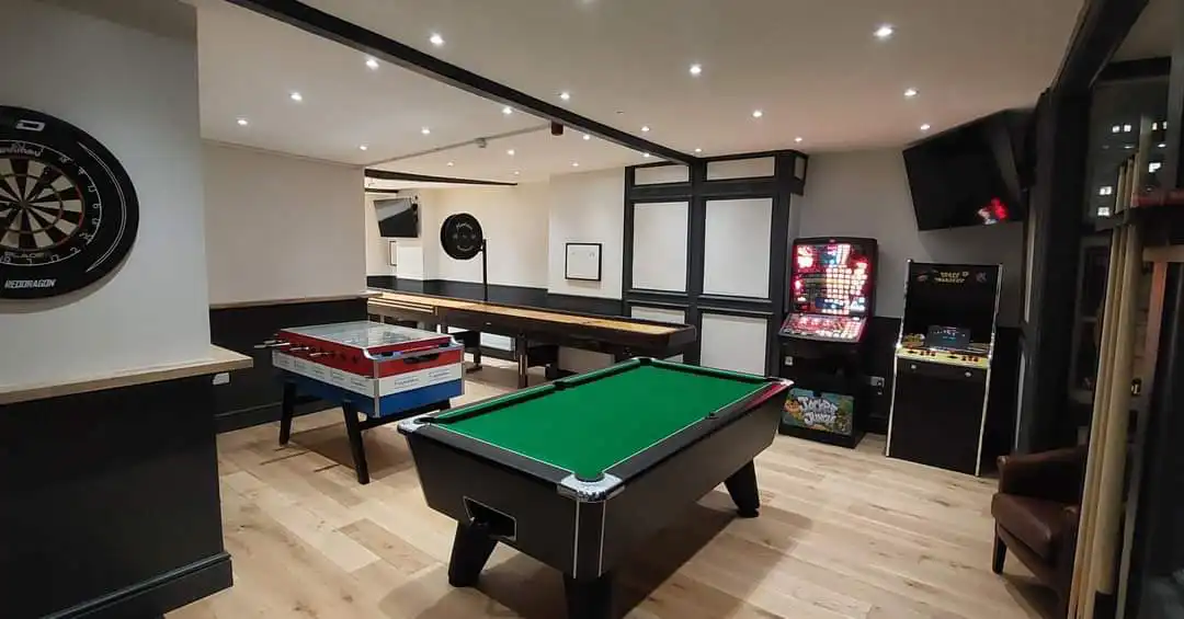 Pool table, dartboards and games space inside The Volley