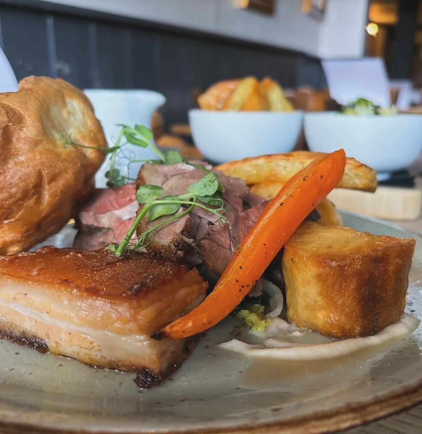 Roast dinner with a Yorkshire pudding, carrots and gravy at The Volley